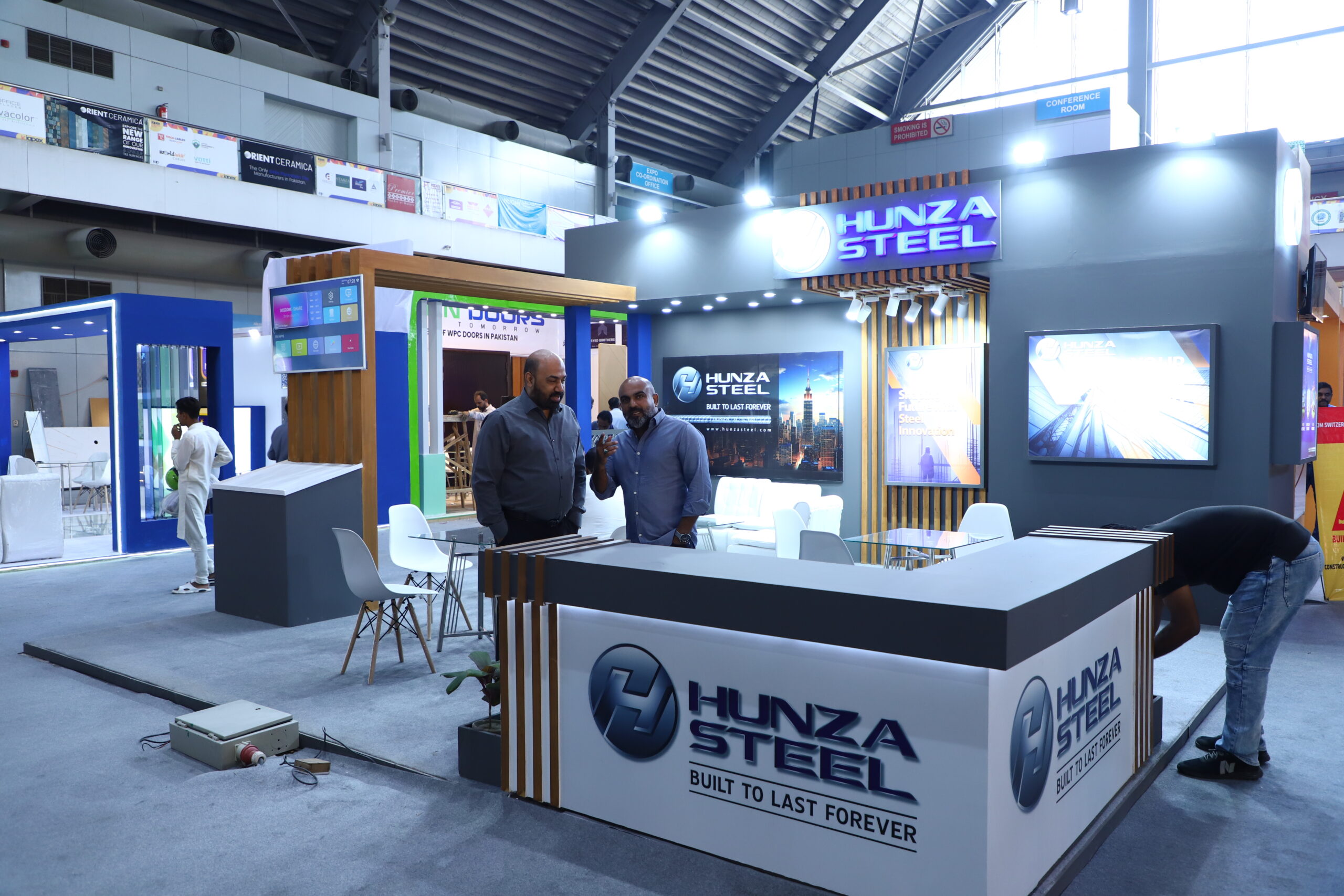 Hunza Steel exhibition stall interior and branding
