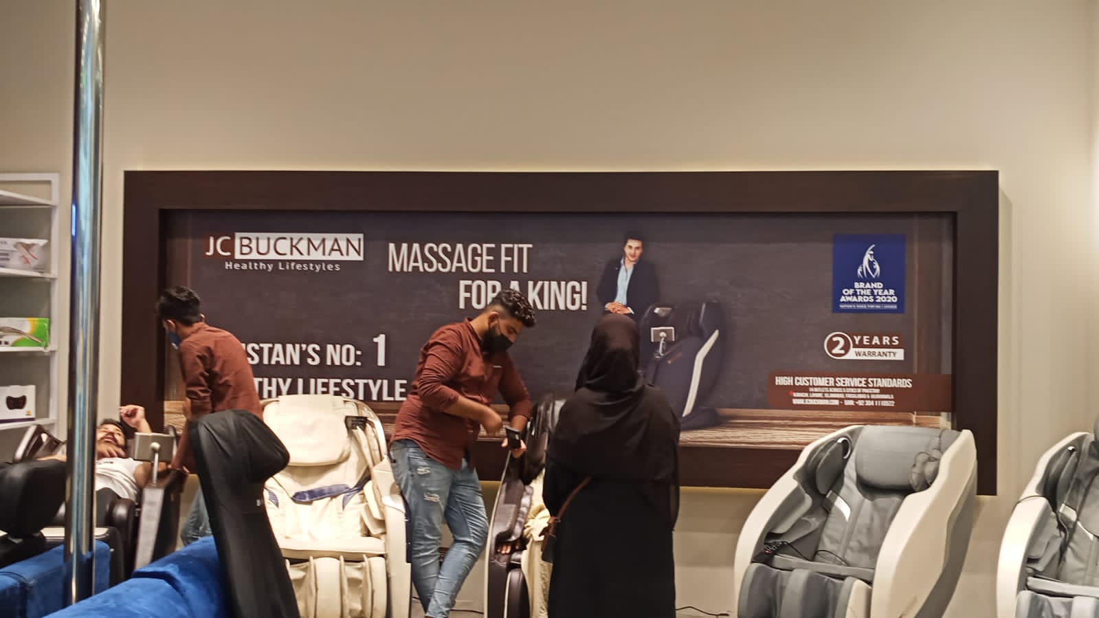 Customer seating and massage chair retail displays in Karachi showroom